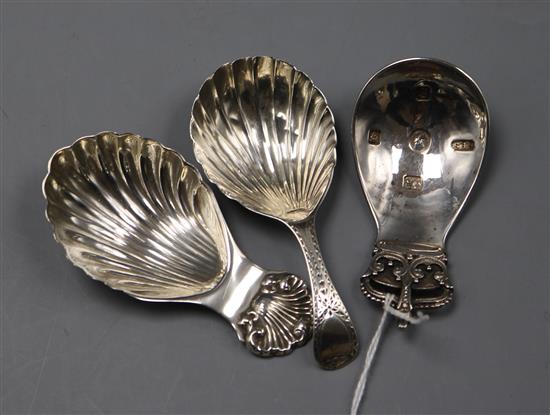 A 1950s silver Coronation caddy spoon by Robert Edgar Stone and two other silver caddy spoons including 19th century.